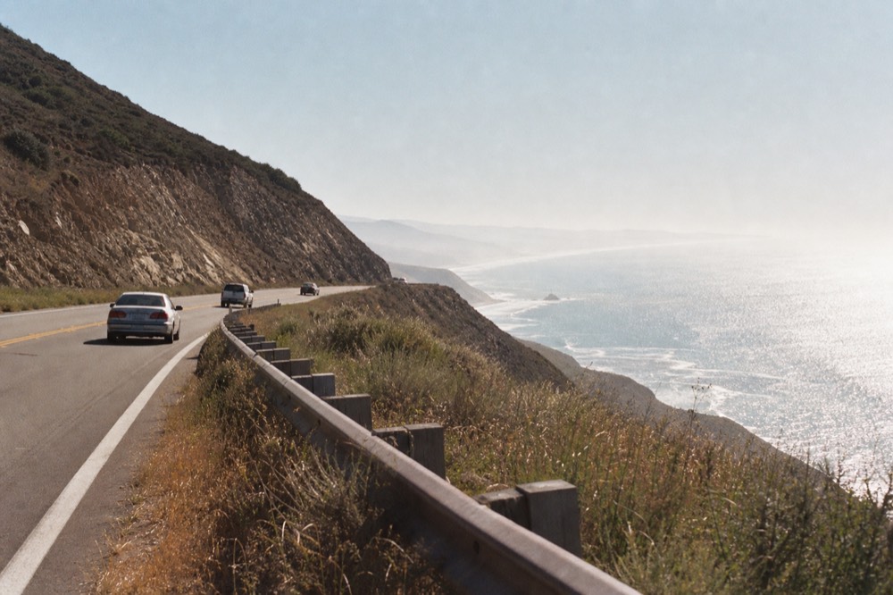 Coastal road south of Ensenada with ocean views, no text, no logos, no people